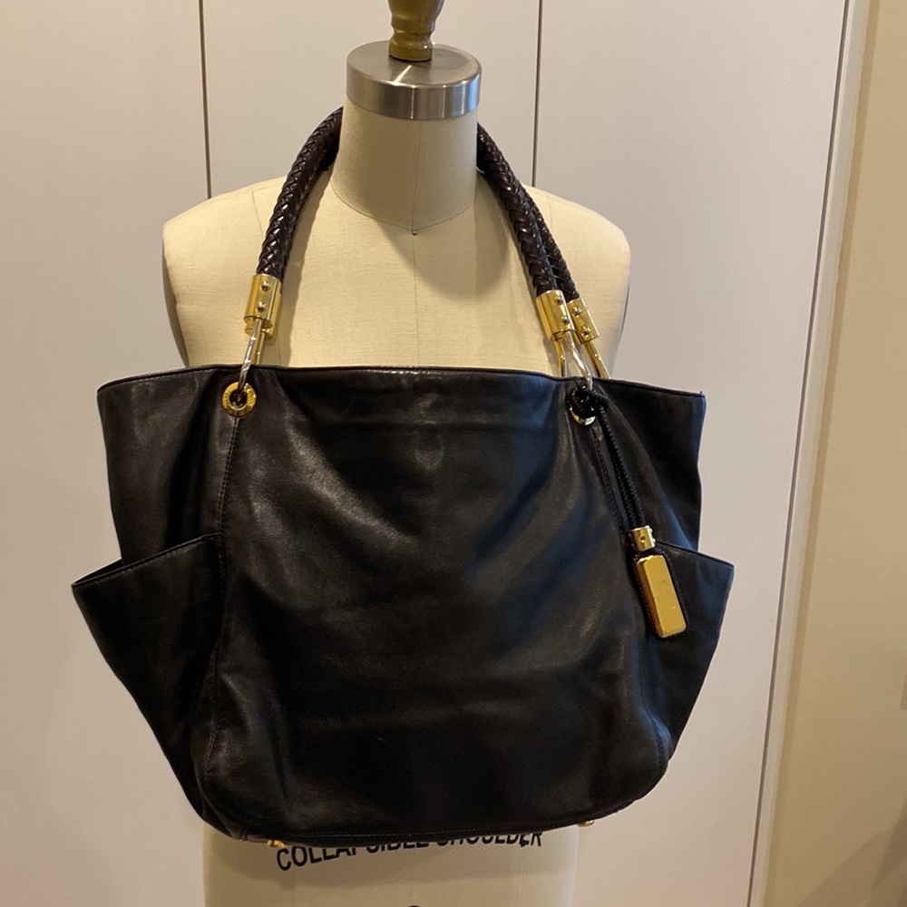 Michael Kors Couture glove leather bag in black and gold